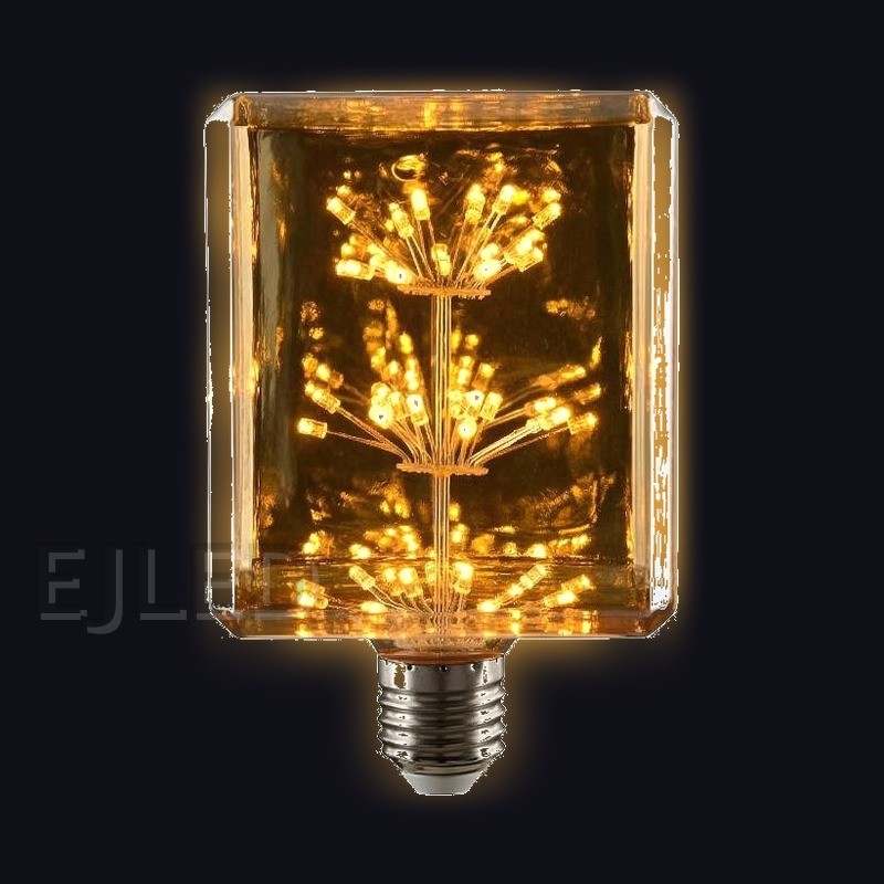 This amber glass starry LED bulb features a rectangular shape with internal light clusters. It works as an eye-catching decorative lamp for fixtures with an Edison screw base. - view 2