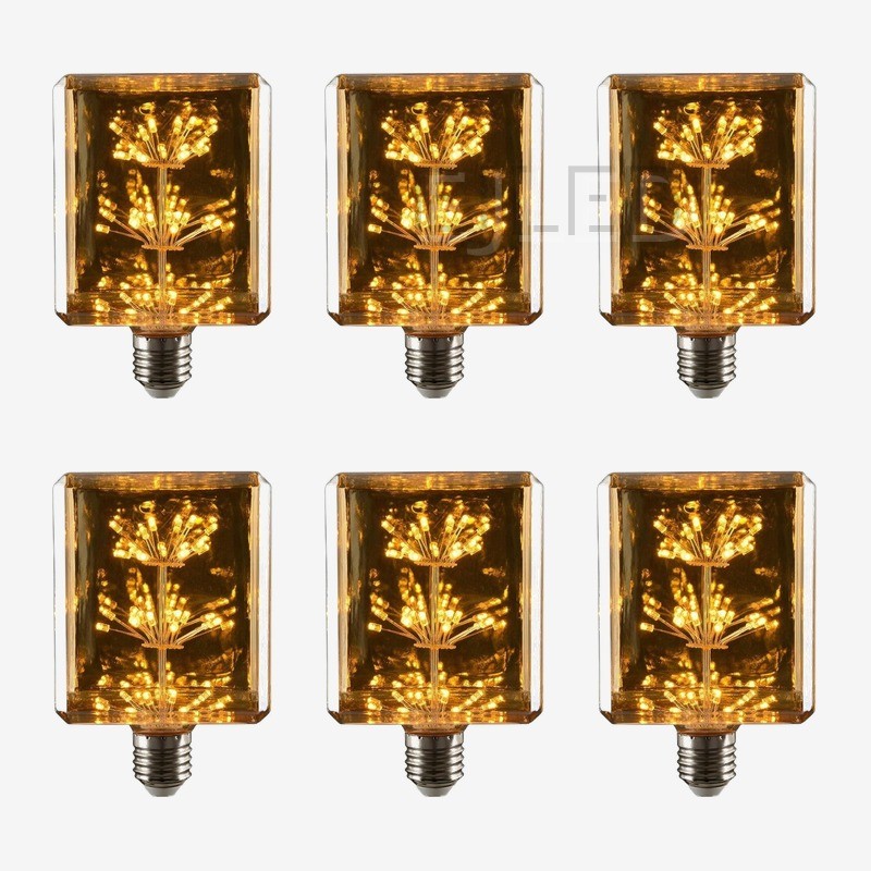 This amber glass starry LED bulb features a rectangular shape with internal light clusters. It works as an eye-catching decorative lamp for fixtures with an Edison screw base. - view 5