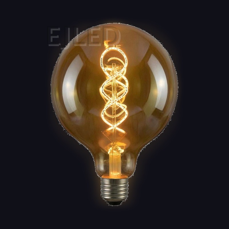 This amber glass soft filament LED bulb features a large round globe shape and a warm decorative spiral filament inside, running on 4 watts. - view 2
