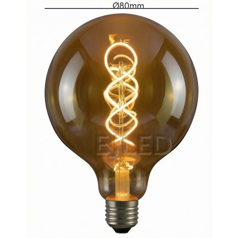 This amber glass soft filament LED bulb features a large round globe shape and a warm decorative spiral filament inside, running on 4 watts. - view 4
