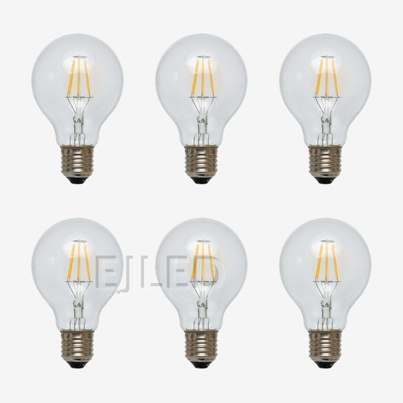 This clear glass globe light bulb features exposed LED filaments and a standard threaded base, designed for decorative fixtures and visible pendant applications. - view 5