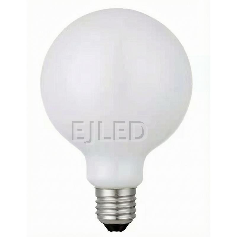 This milky glass G125 globe LED bulb features a spherical shade and a standard screw base for commercial and residential lighting projects.