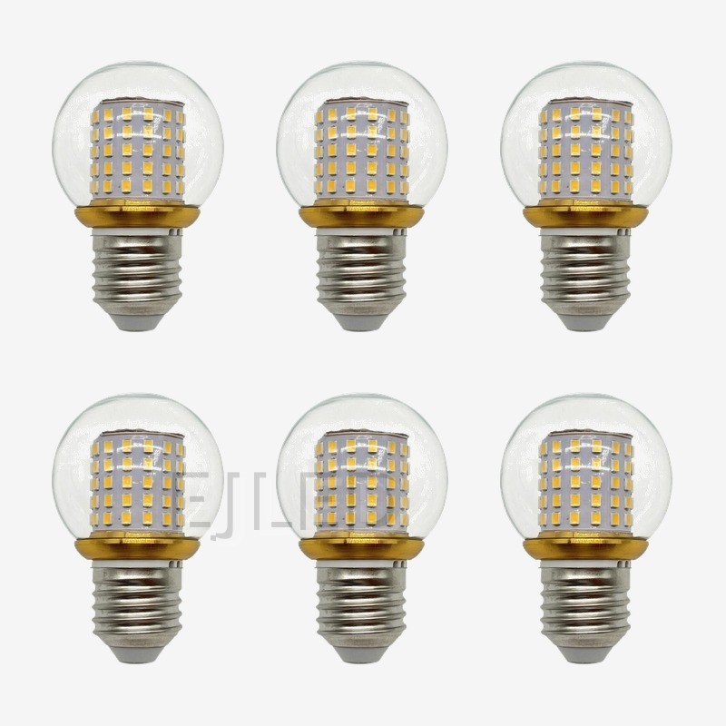 This LED patch bulb features a round clear glass globe enclosing a vertical milky white LED chip array with an E-series screw base and gold collar. - view 5