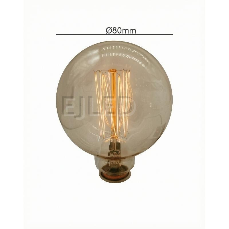 This amber glass incandescent bulb features a large round shape and exposed tungsten filaments inside a clear tinted globe. Model G80-40W-TF. - view 4