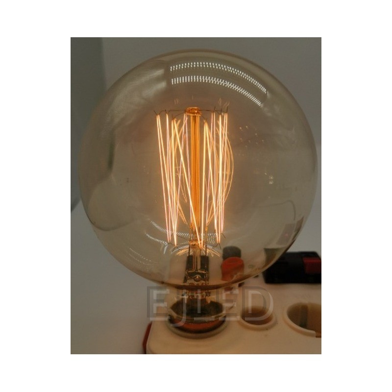 This amber glass incandescent bulb features a large round shape and exposed tungsten filaments inside a clear tinted globe. Model G80-40W-TF. - view 6