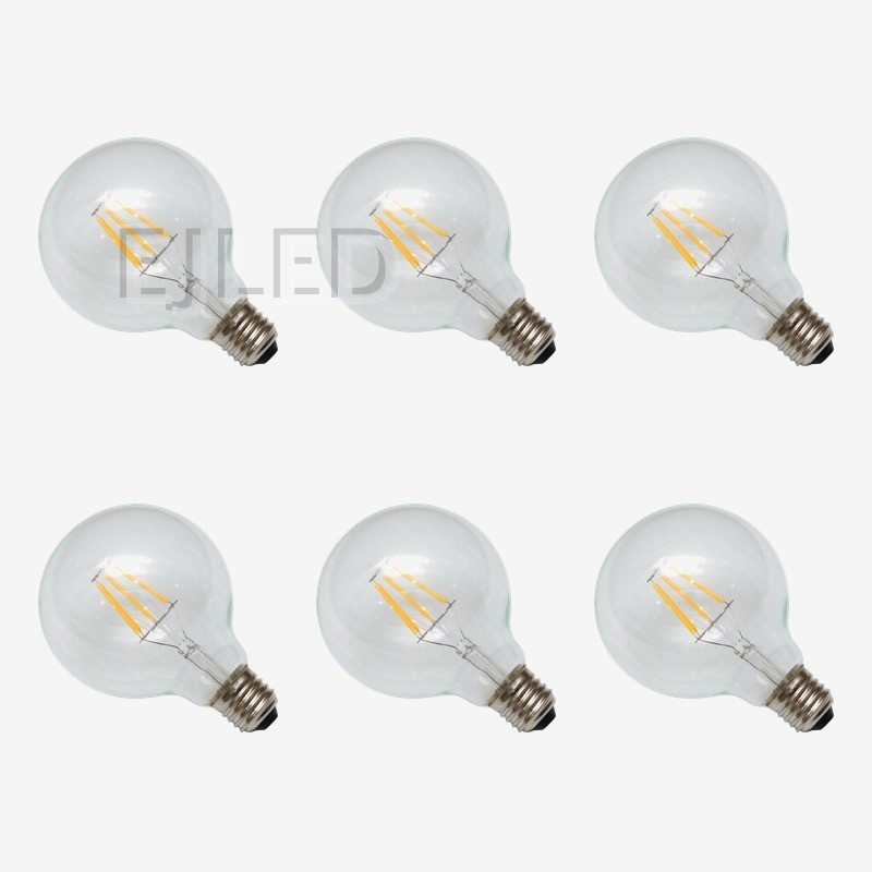 This clear glass globe lamp features three visible linear LED filaments and a standard threaded metal base, offering a classic retro style for exposed fixtures. - view 5