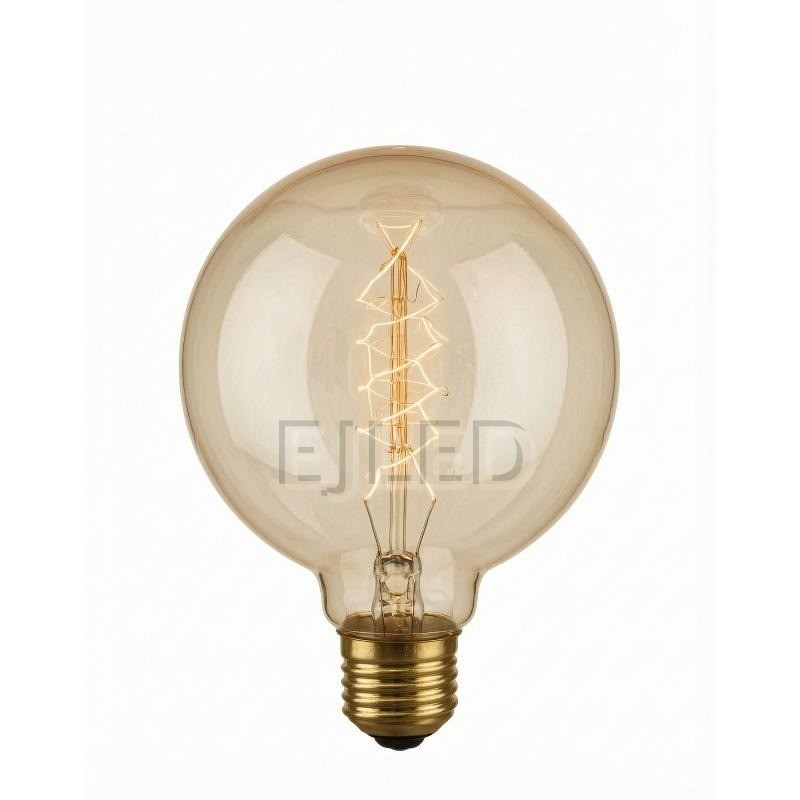 This amber glass G95 incandescent bulb features a spiral tungsten filament inside a large round globe. It operates on standard household voltage with a threaded brass base.