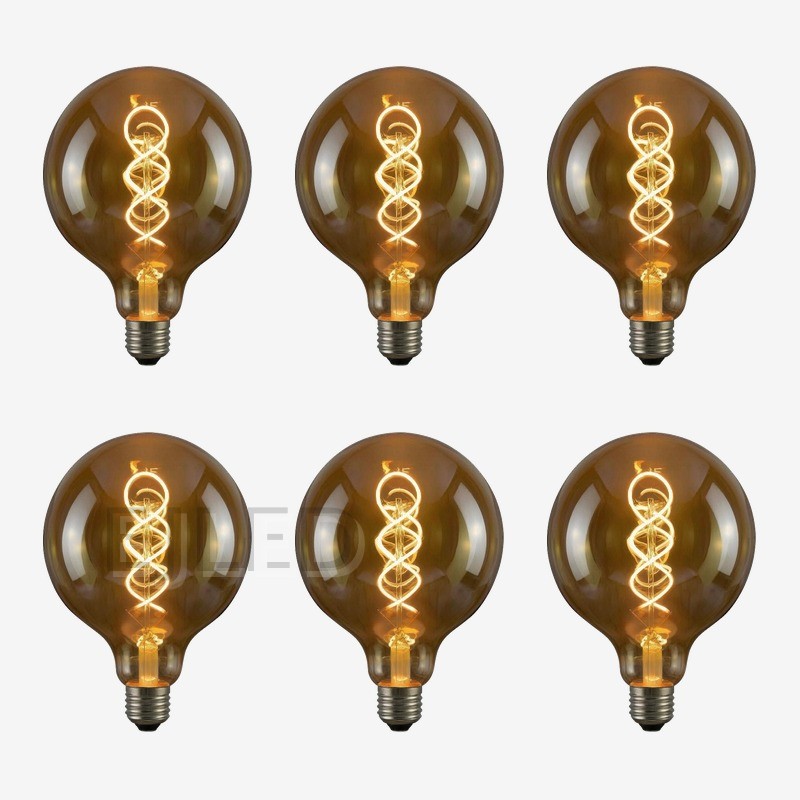 This G95-4W-SF soft filament LED bulb features a round amber glass shade and a spiral LED filament, combining vintage style with modern efficiency. - view 5
