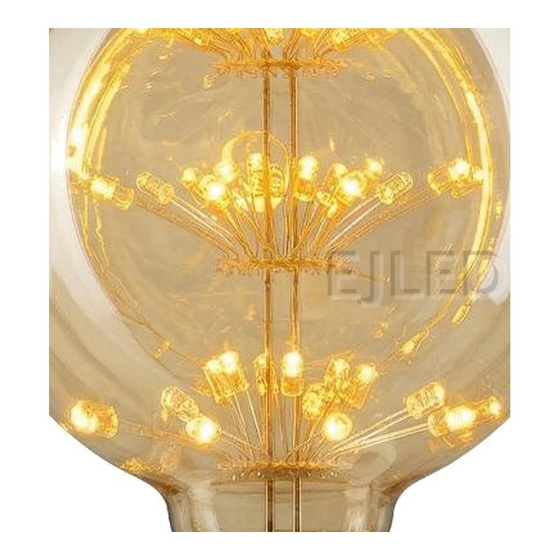 This amber glass G95-ST starry LED bulb features a spherical shade and warm internal lights mounted on thin wire spokes. - view 3