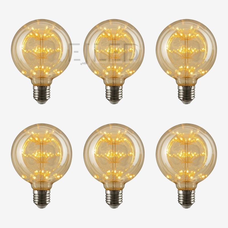 This amber glass G95-ST starry LED bulb features a spherical shade and warm internal lights mounted on thin wire spokes. - view 5