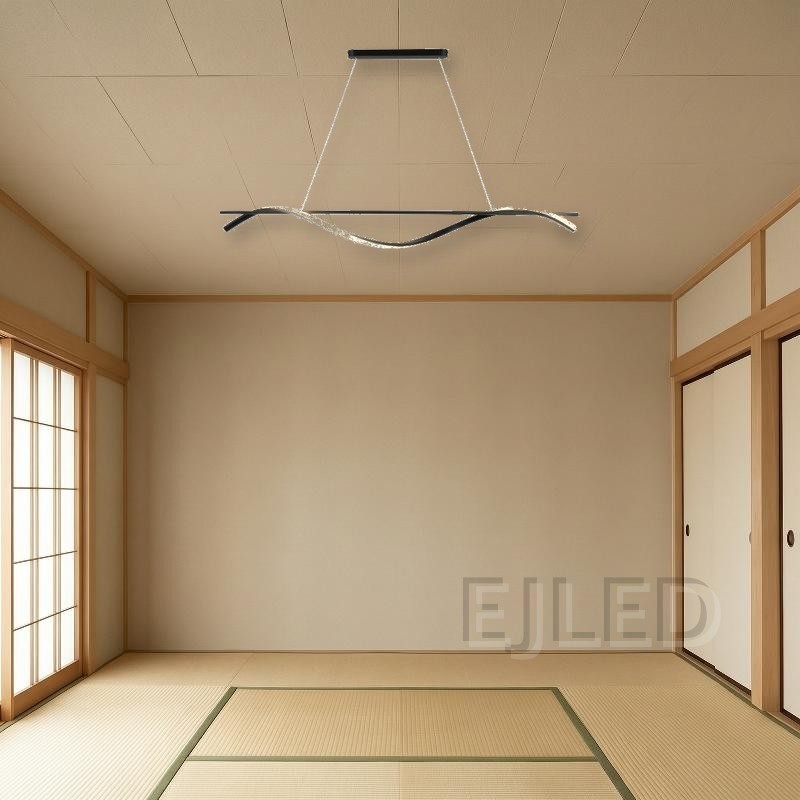 This modern black wave LED pendant light features a linear metal bar paired with a dramatic flowing wave LED element suspended by thin cables. - view 5