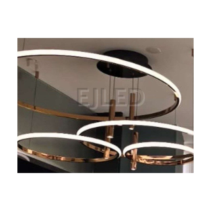 This multi-ring LED ceiling light features four graduated rings in a polished rose gold finish suspended from a round black canopy. - view 2
