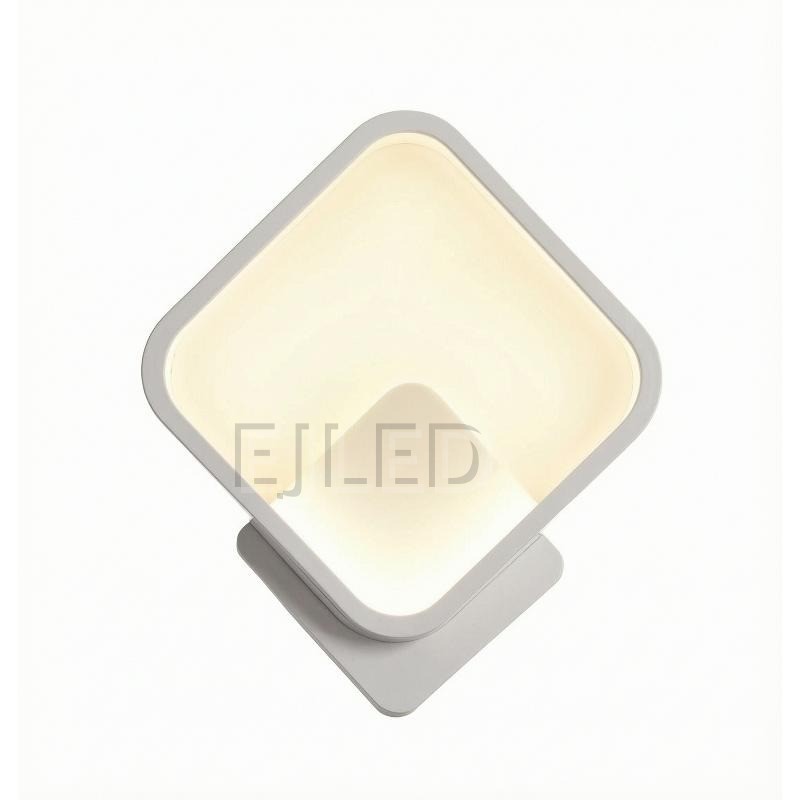 This modern diamond LED wall sconce features a geometric square shade angled on a matching base, casting soft illumination through an enclosed diffuser. Ideal for commercial and residential interiors.