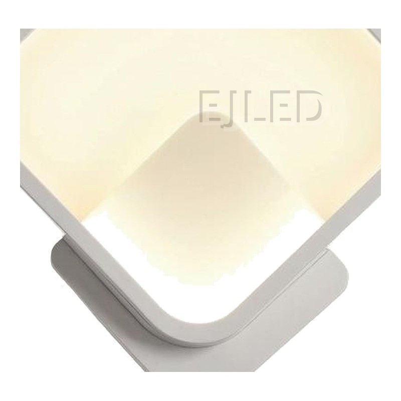 This modern diamond LED wall sconce features a geometric square shade angled on a matching base, casting soft illumination through an enclosed diffuser. Ideal for commercial and residential interiors. - view 3