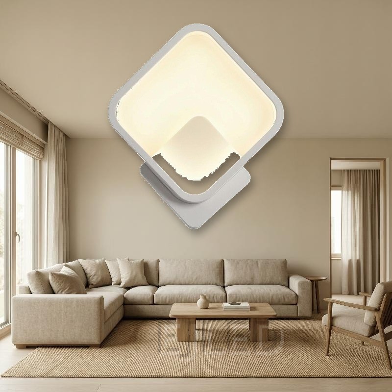 This modern diamond LED wall sconce features a geometric square shade angled on a matching base, casting soft illumination through an enclosed diffuser. Ideal for commercial and residential interiors. - view 4