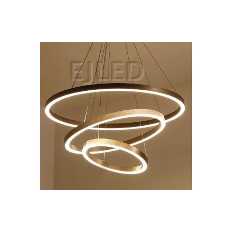 Three nested aluminum rings suspend at staggered angles from adjustable steel cables, combining brushed metallic finishes with continuous internal LED illumination. - view 2