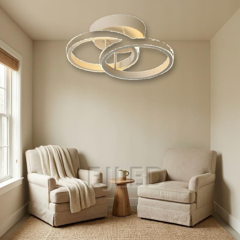 This LED ceiling light features three open circular rings arranged in an overlapping layout on a round base. The white finish creates a clean lighting fixture. - view 4