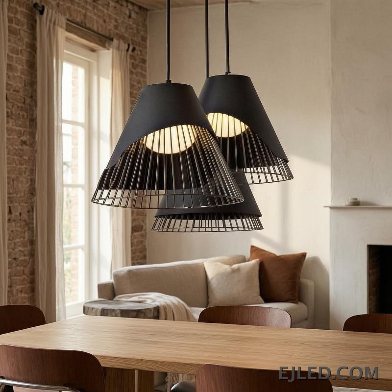 This iron pendant light features a black conical shade with an integrated open wire cage, revealing a warm, internally shielded light source. The unique layered design offers a distinctive aesthetic. - view 5