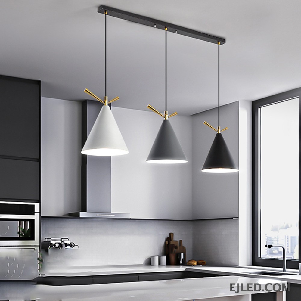 This pendant fixture features three cone-shaped metal shades in white, gray, and black, each accented with gold-colored details and an open bottom. It hangs from a single black circular canopy. - view 5