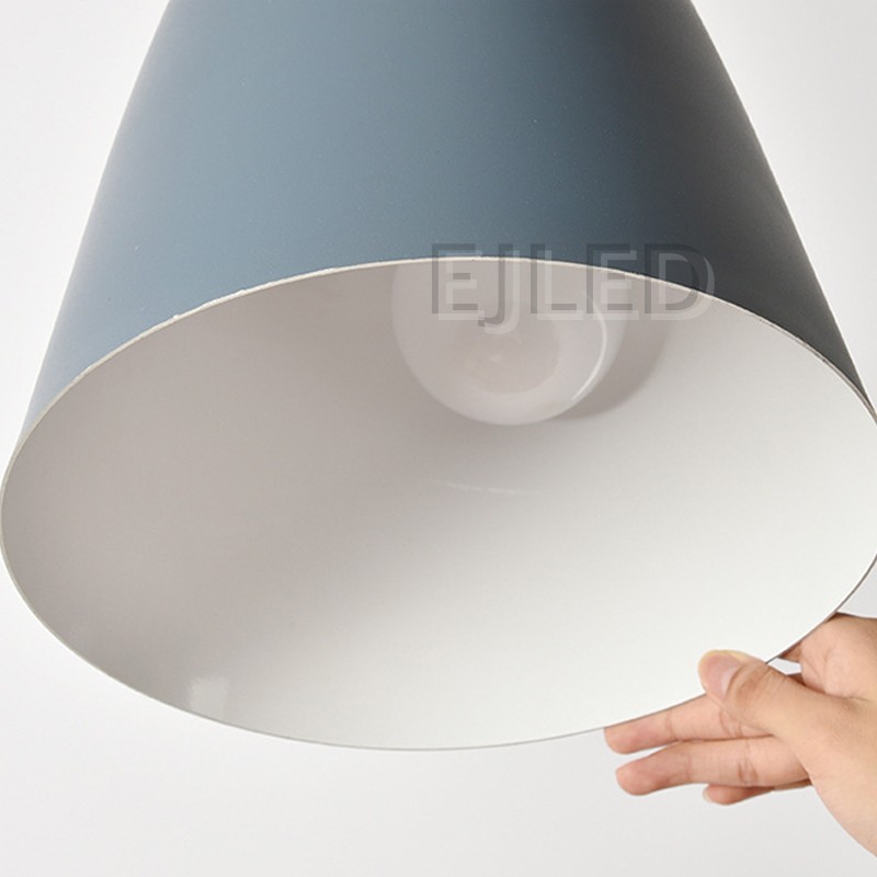 This steel barn pendant light features a solid dome shade in a blue finish, suspended by a black cord and a metal wire hanger. - view 6