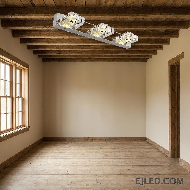 Esta lámpara de espejo de cristal de triple cabezal presenta tres pantallas de cristal individuales, montadas sobre una base de acero inoxidable cromado pulido, ideal para iluminación de tareas sobre espejos. - view 4