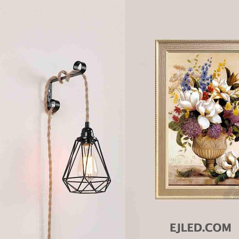 The RP0001 pendant light features a long, adjustable natural hemp rope, allowing for significant drop from its iron ceiling fixture. It provides direct, downward illumination suitable for areas with high ceilings or where a prominent, single light source is desired. - view 2