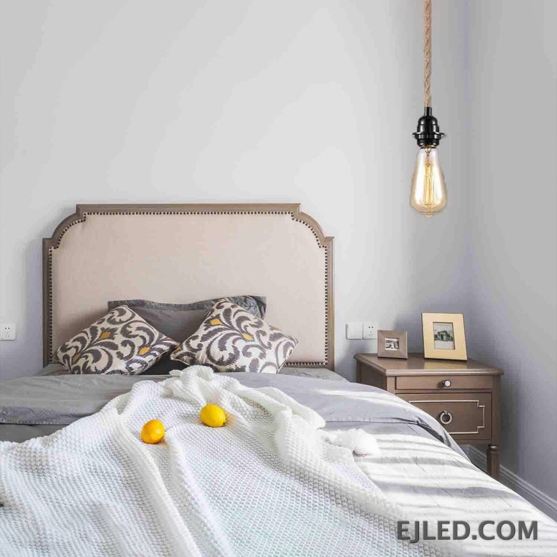 The RP0001 pendant light features a long, adjustable natural hemp rope, allowing for significant drop from its iron ceiling fixture. It provides direct, downward illumination suitable for areas with high ceilings or where a prominent, single light source is desired. - view 6