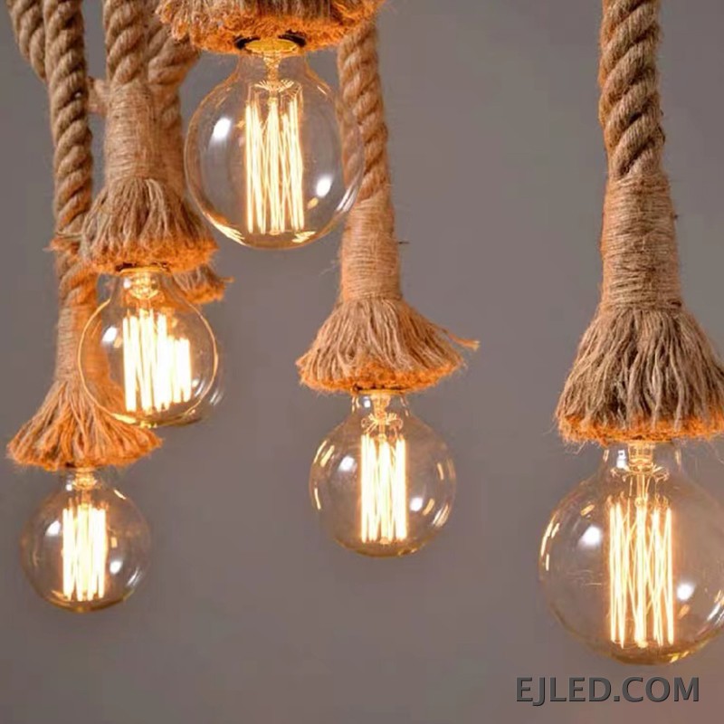 This multi-light hemp rope chandelier features a horizontal bamboo body with five exposed bulbs suspended by braided ropes, offering a rustic aesthetic. - view 3