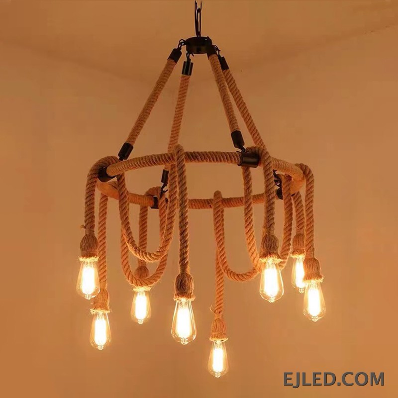 A unique hemp rope chandelier presenting five exposed glass lamps, suspended by rope from a central chain. This fixture features a natural rope finish and a rustic design. - view 3