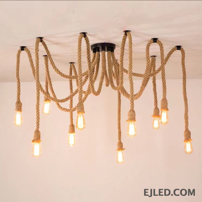 This RP0008 Hemp Rope Chandelier features ten exposed glass bulbs suspended from natural twisted hemp ropes. The ropes extend from a black canopy and mounting points, creating a distinct, organic multi-point lighting design. - view 2