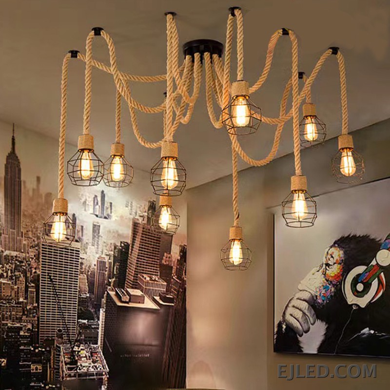 This RP0008 Hemp Rope Chandelier features ten exposed glass bulbs suspended from natural twisted hemp ropes. The ropes extend from a black canopy and mounting points, creating a distinct, organic multi-point lighting design. - view 5