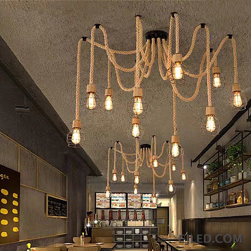 This RP0008 Hemp Rope Chandelier features ten exposed glass bulbs suspended from natural twisted hemp ropes. The ropes extend from a black canopy and mounting points, creating a distinct, organic multi-point lighting design. - view 6