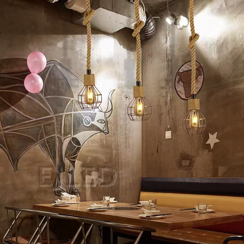 This single pendant light features a natural hemp rope suspension with a decorative knot, paired with an open metal wire cage shade. - view 3