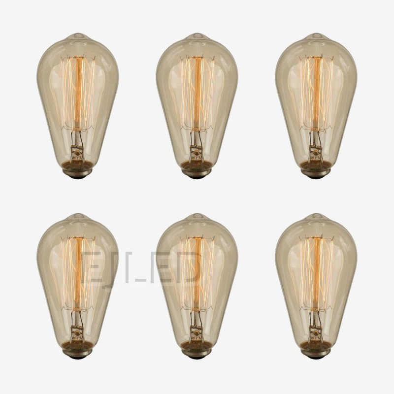 This amber glass ST64 incandescent bulb features a warm tungsten filament design, supplying nostalgic illumination for hospitality and residential interior lighting projects. - view 5