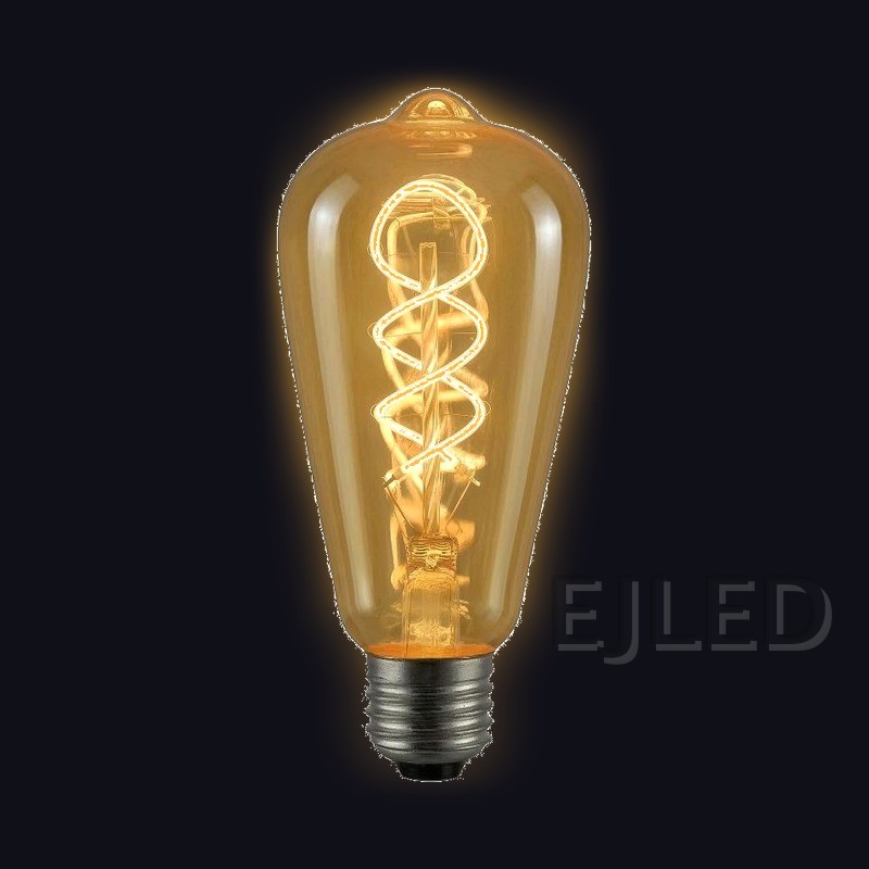 This amber glass ST64 soft filament LED bulb features a warm spiral light inside a teardrop shaped vintage shade. It operates on low wattage. - view 2