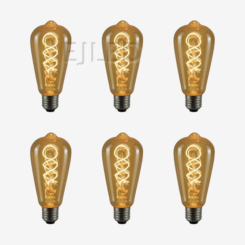 This amber glass ST64 soft filament LED bulb features a warm spiral light inside a teardrop shaped vintage shade. It operates on low wattage. - view 5