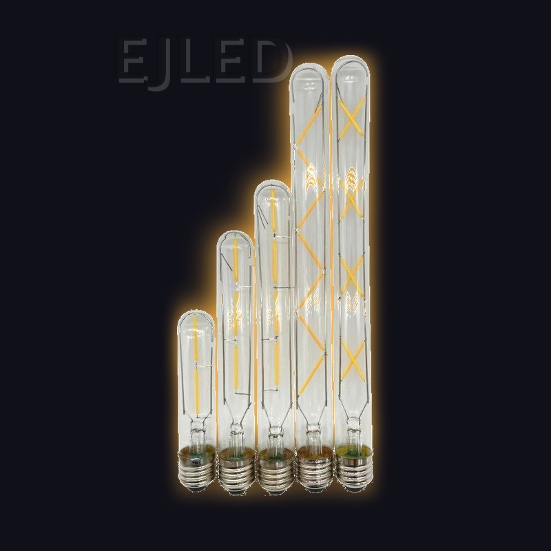 Clear tubular glass T20 filament LED bulbs feature visible yellow LED filaments arranged in various configurations inside elongated glass tubes with standard screw bases. - view 2