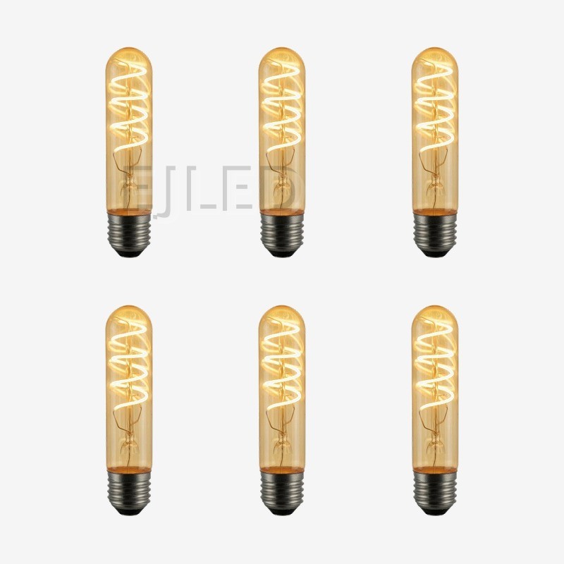 This amber glass soft filament light bulb features a tubular shape and a visible spiral LED filament inside. - view 5