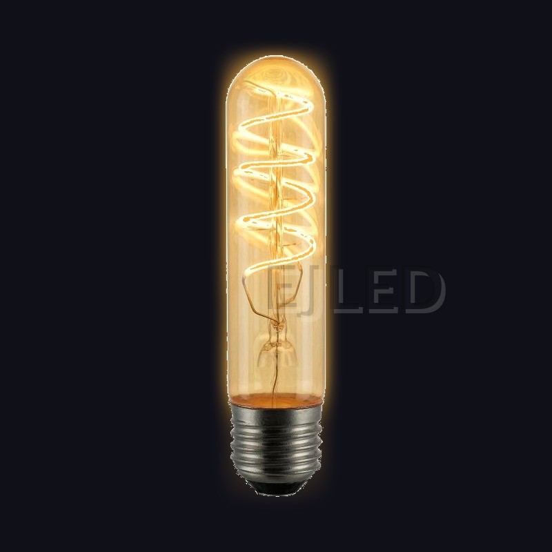 This vintage bulb lamp features an elongated amber glass tube shade with a visible soft LED filament inside, creating a warm nostalgic glow for decorative commercial and residential lighting fixtures. - view 2