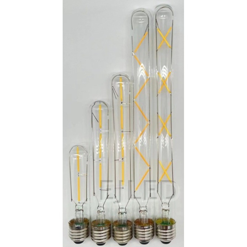 These clear glass T30 LED Edison bulbs feature visible interior filaments and standard screw bases in a selection of vertical lengths. - view 6