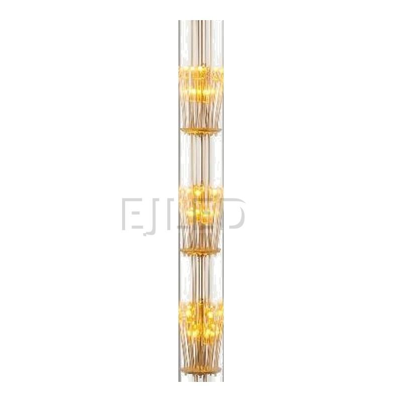 This T30 Starry LED bulb features multiple stacked internal starburst filament clusters inside a tall amber glass tubular enclosure with an Edison screw base. - view 3