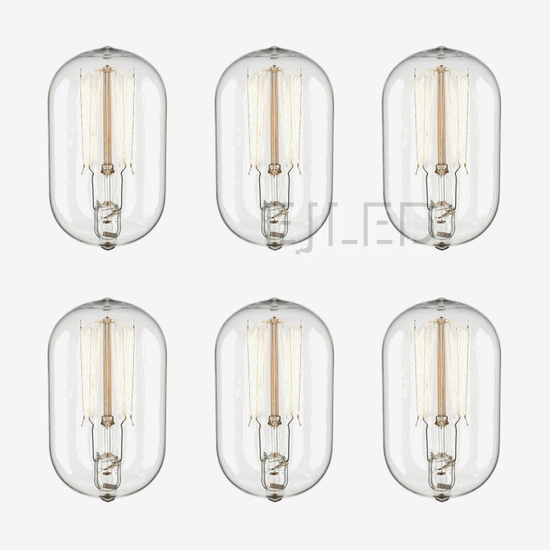 This clear glass tubular incandescent bulb features a visible vertical tungsten filament structure and a smooth, rounded glass envelope design. - view 5