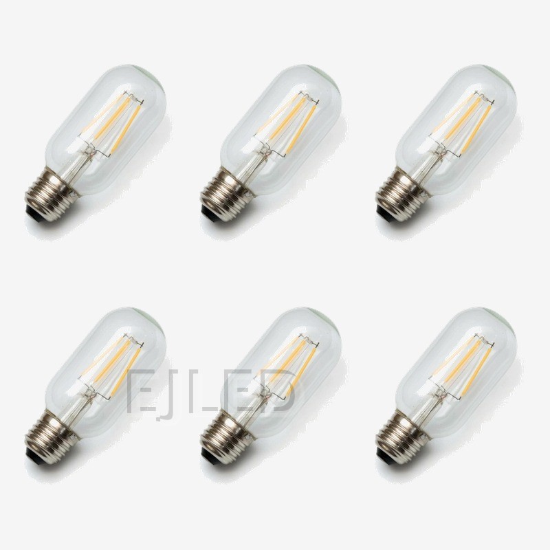This clear glass tubular LED filament bulb features vertical internal filaments inside a transparent capsule with a standard screw base, model T45-FL. - view 5