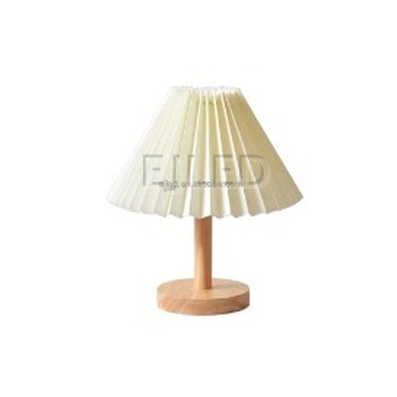 This wooden base table lamp features an off white pleated fabric shade supported by a natural wood stem and round wooden base. - view 2