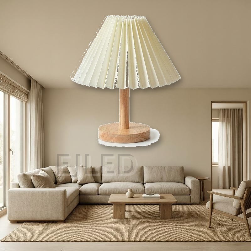 This wooden base table lamp features an off white pleated fabric shade supported by a natural wood stem and round wooden base. - view 4