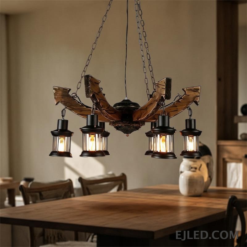 This wooden chandelier features six lantern-style lights suspended from curved, dark brown wooden beams. Each lamp includes a black metal frame and clear, ribbed glass, providing warm, enclosed illumination from visible filament bulbs. - view 4