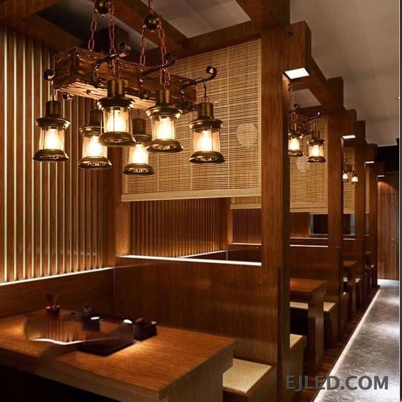 Crafted from natural wood, the WD0005 features two cylindrical pendant lamps suspended together, providing focused downward illumination. Its multi-lamp design suits longer counters or tables, offering a balanced light distribution. - view 3