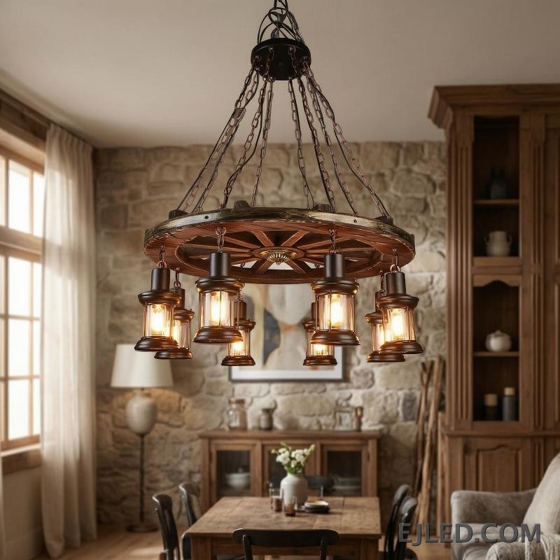 This fixture features a distressed wooden wagon wheel frame suspending eight lantern-style lights. It hangs from multiple chains, creating a rustic aesthetic suitable for various interior designs. - view 5