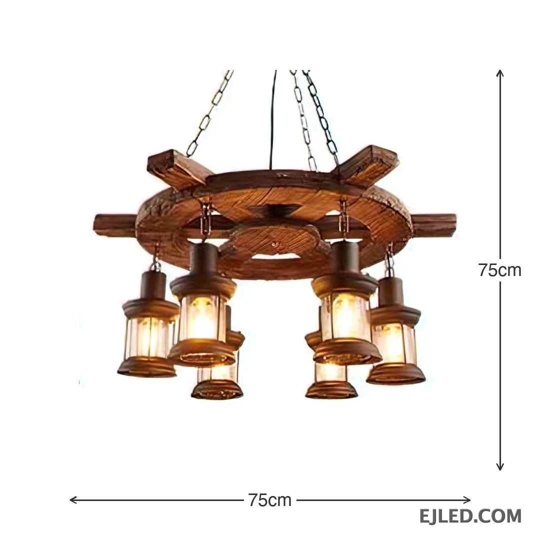This wooden chandelier features a dark, rustic wagon wheel design with a 75cm diameter. Six clear glass lantern-style lights hang, offering an enclosed yet visible light source. - view 3