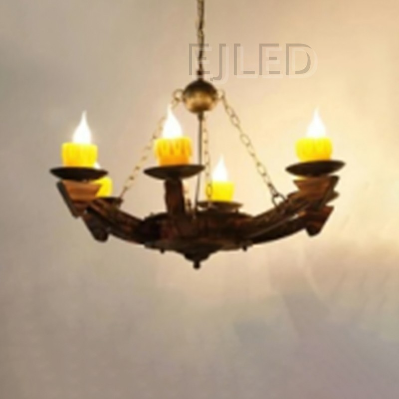 This wooden chandelier pendant light features curved wooden arms holding cylindrical candle style lamps with realistic flames, suspended from a central metal chain. - view 2